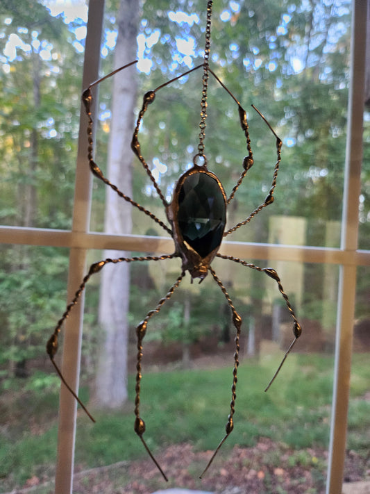 The Silver Weaver: Tiffany-style spider suncatcher with a copper-foiled black glass prism and hand-twisted silver soldered legs